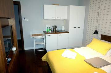 Фото номера Стандартный двухместный номер с мини-кухней Апарт-отели Apartamenty Paliki г. Ястшембя-Гура 7