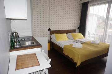 Фото номера Стандартный двухместный номер с мини-кухней Апарт-отели Apartamenty Paliki г. Ястшембя-Гура 8