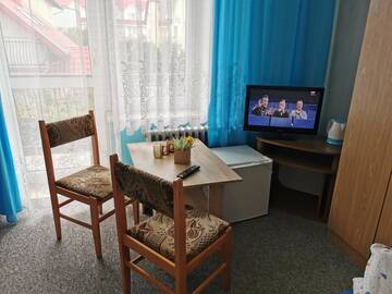 Фото номера Трехместный номер с собственной ванной комнатой Проживание в семье Pokoje Gościnne Jastrzębia Góra г. Ястшембя-Гура 4