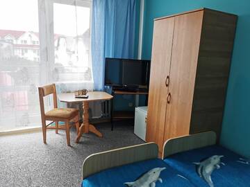 Фото номера Трехместный номер с собственной ванной комнатой Проживание в семье Pokoje Gościnne Jastrzębia Góra г. Ястшембя-Гура 3