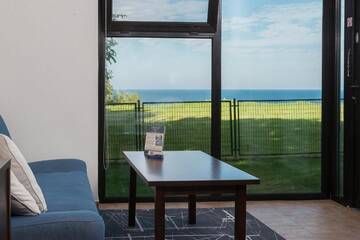 Фото номера Бунгало (для 2 взрослых) с видом на море Отель Hotel Restauracja Faleza г. Ястшембя-Гура 2